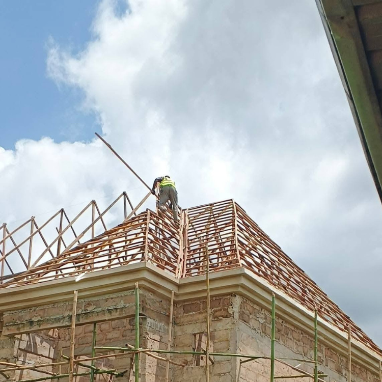 Dundee Roofers Installing Mega top of the Roof